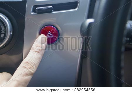 Emergency Button In The Car.finger Hitting Car Emergency Light Botton