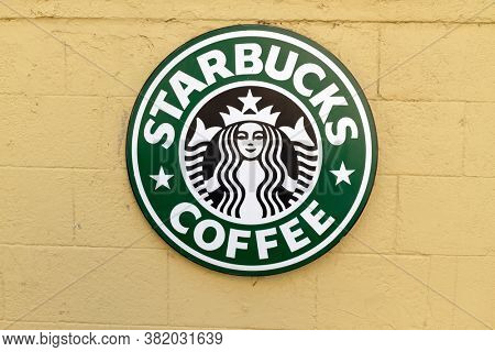 Rhodes, Greece - July 2 2011 Starbucks coffee sign. Starbucks Coffee is an American chain of coffee shops, founded in Seattle.