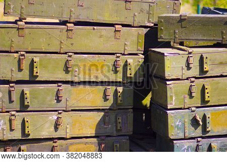 Green Wooden Military Boxes For Rearmament On The Field At A Military Competition
