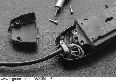 Electric Splitter, Cable And Screwdriver. Connecting Wiring To The Contacts Of The Electrical Splitt