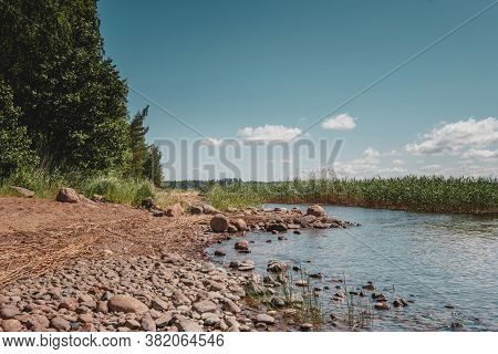 Huge Stones On The River Bank. Vuoksa River Near Imatra In The Leningrad Region, Russia. Coastline W