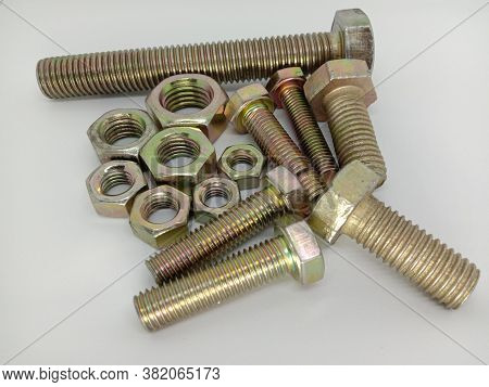Iron Nuts And Bolt Closeup On White Background
