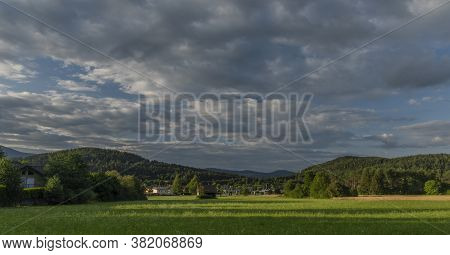 Color Evening With Cloudy Blue Sky In Ledenitzen Village In South Austria