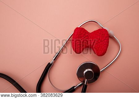 Concept Of Diagnosis And Detecting Diseases Of Endocrine System Organ - Thyroid Gland. Stethoscope A
