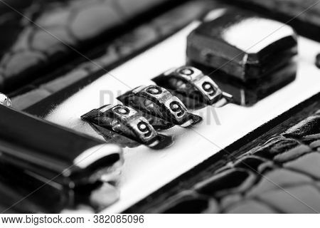 A Combination Lock On A Crocodile Leather Business Briefcase. Lock On A Briefcase Close-up. Security