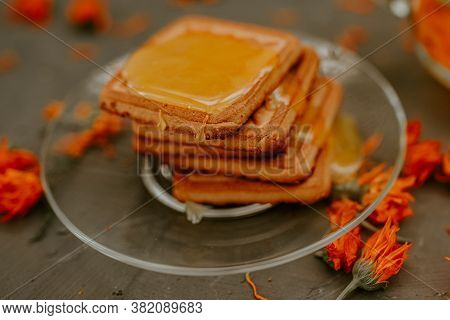 The Honey On Baked Goods. Orange Calendula Flower Tea