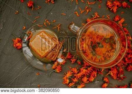 The Honey On Baked Goods. Orange Calendula Flower Tea