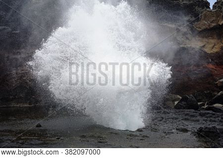 Water explosion along the shore of maui hawaii