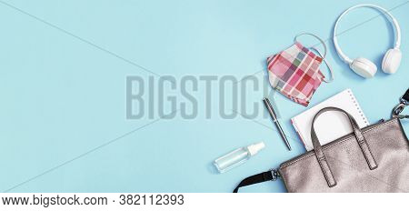 Grey Leather Backpack With School Supplies And Personal Protective Equipments. Face Shields And Hand
