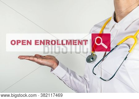 Open Enrollment. Female Doctor With Stethoscope. Searching For Information On The Internet
