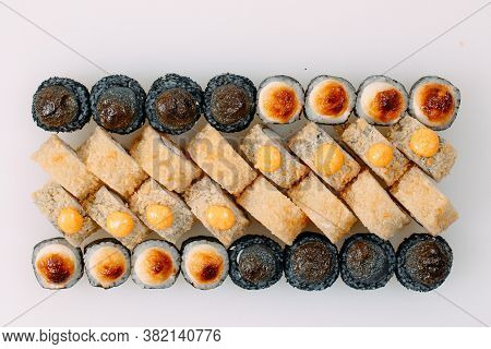 Many Types Of Shusha Are Stacked In A Row.