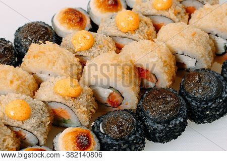Many Types Of Shusha Are Stacked In A Row.