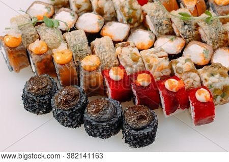 Many Types Of Shusha Are Stacked In A Row.
