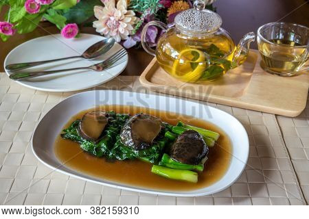 Chinese Broccoli With Oyster Sauce. Stir-fried Chinese Broccoli And Shiitake Mushroom In Oyster Sauc