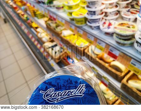 German Cheese Casarelli Mozzarella From Fresh Milk Against The Background Of The Counter Of Cheese P
