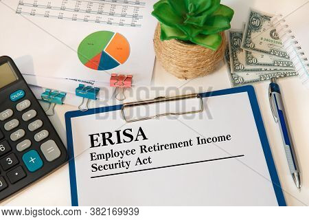 Paper With Employee Retirement Income Security Act Erisa On The Office Desk