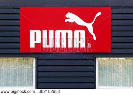 Skanderborg, Denmark - July 16, 2019: Puma Logo On A Facade. Puma Is A Major German Multinational Co