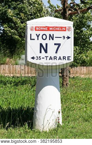 Charbonnieres, France - May 26, 2020: Old Michelin Milestone On The Mytic Route Nationale 7 In Franc