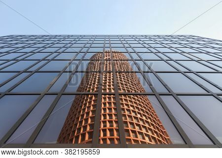 Lyon, France - March 26, 2016: Reflection Of The Part-dieu Tower In A Facade. The Building Rises 164