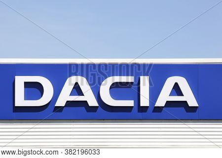 Villefranche, France - May 24, 2020: Dacia Logo On Wall Of A Dealer. Dacia Is A Romanian Car Manufac