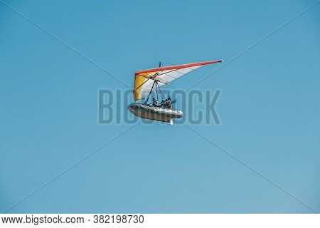 Saint Florent, Corsica, France - 22nd August 2020: A Rigid Inflatable Flying Boat Soars Above The Ba