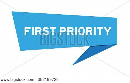 Blue Color Paper Speech Banner With Word First Priority On White Background