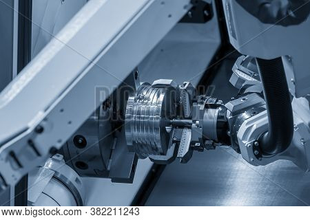 The Hi-technology Cnc Lathe Machine Operation With Gripping Robotic System.the Cobot  Operation Conc