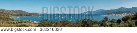 Yachts Fill The Bay On A Beautiful Summers Day At Saint Florent In Corsica With Cap Corse In The Dis
