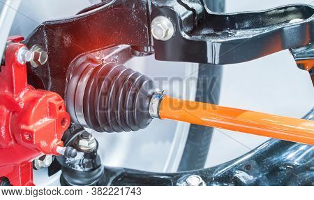 electric system of eco car front driving axle in the car, visible elements of the steering system