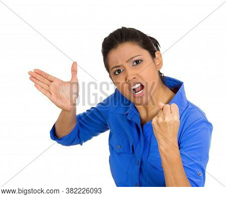 Closeup Portrait Of An Angry Upset Young Woman Fist Up About To Give You Knuckle Sandwich And Slap Y