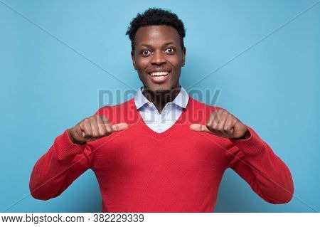 African Man Pointing With Fingers On His Chest. Select Me Please.