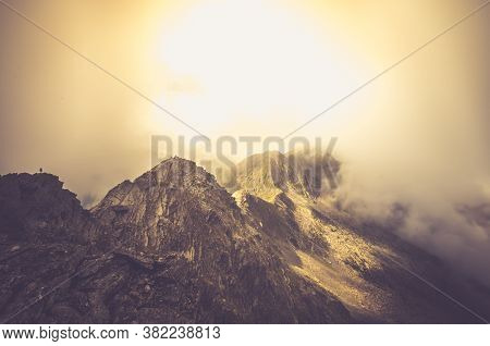 Misty Fagaras Mountains, Romania. Mist Over The Alps Of Transylvania.