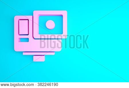 Pink Action Extreme Camera Icon Isolated On Blue Background. Video Camera Equipment For Filming Extr