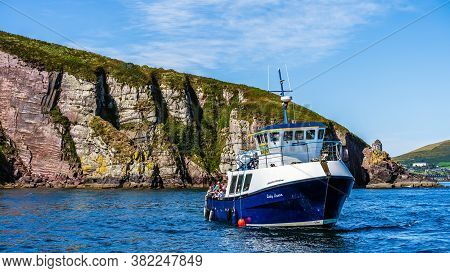 Dingle, Ireland, August 2018 Boat Tour Leaving Dingle Harbour For Sightseeing And Fungie Dolphin Wat
