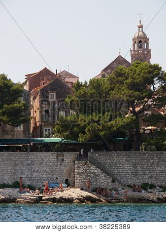 Korcula - July 12: Tourist And Locals Find Refreshment In The Adriatic Ocean As Croatia Suffers One
