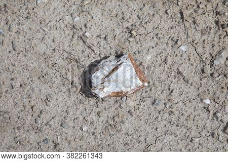 Background Of Cracked Clay After A Rainshower And Hot Sun