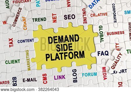 Economy And Business Concept. Puzzle With Economic Captions, In The Center The Inscription - Demand 
