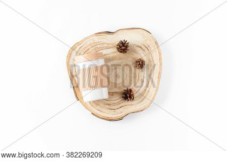 Reusable Eco Friendly Bamboo Cup For Take Away And Wooden Crossection On White Background. Sustainab