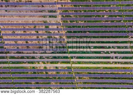 Aerial View Of The Solar Panel In Solar Farm For Green Energy
