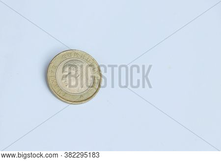 One Turk Lirasi Or Turkish Lira Coin Money On The White Background. Concept Of Finance Or Currency.