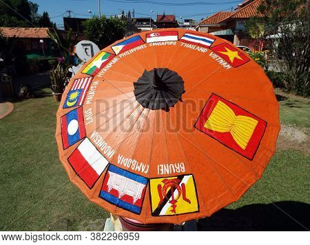 Bor Sang, Chiang Mai, Thailand, December 22, 2018: Parasol With The Flags Of The Countries That Make