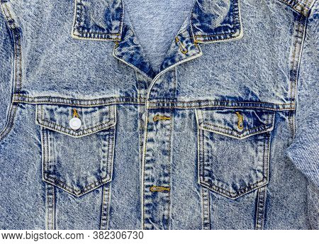 Close-up Photo Of Several Elements Of A Beautiful And Fashionable Denim Jacket.