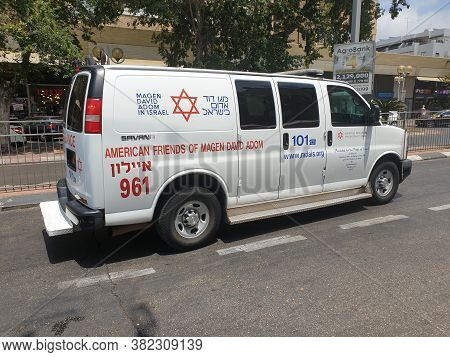 Holon, Israel. August 04, 2020. A White Magen David Adom (mada) Emergency Ambulance Minivan At Sokol