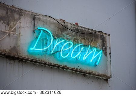 Blue Neon Sign Dream On A Grimy Wall Of London Street