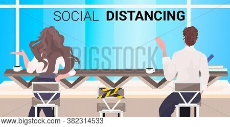 Rear View Cafe Visitors Keeping Distance To Prevent Coronavirus Epidemic Social Distancing Concept P