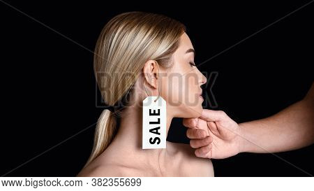Weaker Sex And Protection Of Rights. Male Hand Touches To Face Of Disappointed Woman With Label On E