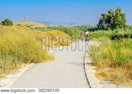 Nir David, Israel - August 23, 2020: View Of A Footpath, With Visitors, In The Spring Valley Park (p
