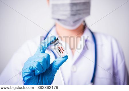 Closeup Female Woman Doctor Or Scientist In Uniform Wearing Face Mask Protective In Lab Use Hand Fin