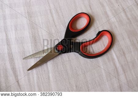 A Pair Of Scissors With White Background. Stationary, Household, Tailor And Hair Cutting Tool.
