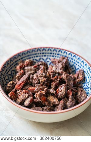 Bitter Chocolate Covered Goji Berries / Berry. Healthy Raw Organic Wolfberry Snacks.